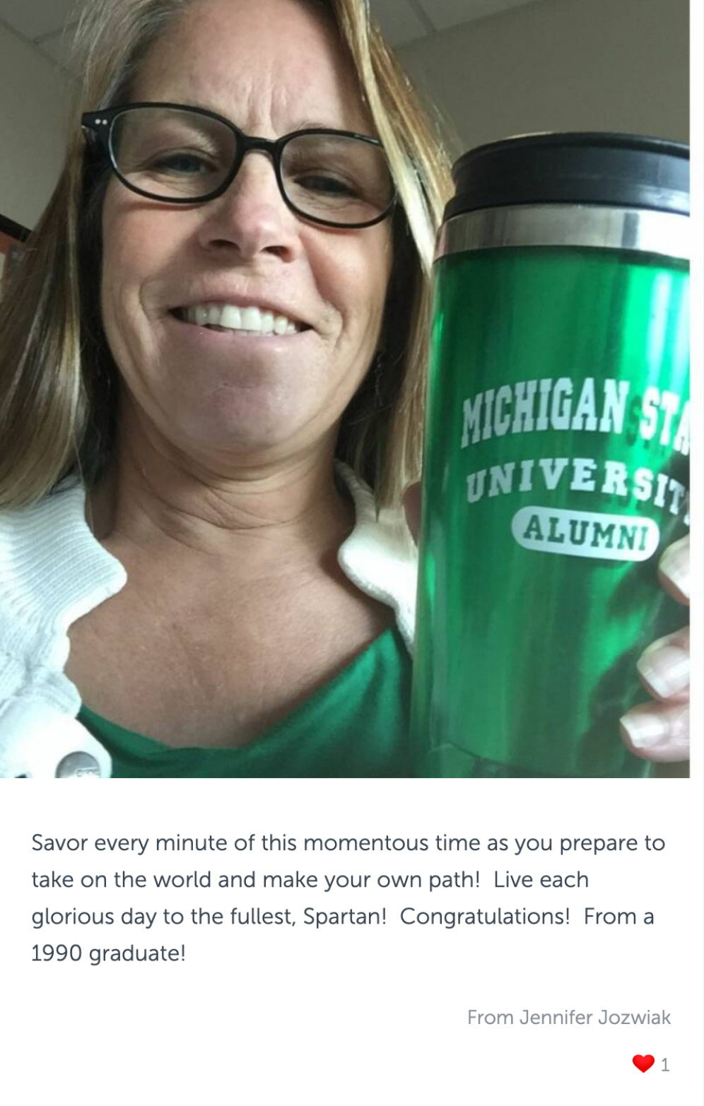 Post with photo of a woman holding cup that reads "Michigan State University Alumni", and congratulatory message